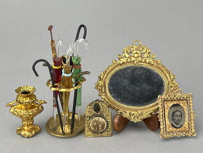 Soft Metal Group Of Accessories: Umbrella stand with various umbrellas including 3 glass umbrellas from Czechoslovakia, marked, 3 1/2". Heavy Ormolu oval mirror, 2 1/2", notice the fruit on top. Ormolu vase or lamp base, 1