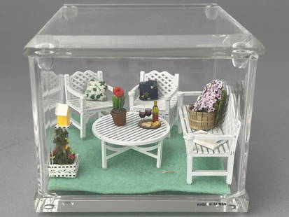 1/2" Scale Wood Patio Set And Accessories: All set up in a little display box, 4 x 4 x 3 1/2", but you can move to your favorite little beach house and use the box for M&M's! Accessories include pillows, plants, wine, magazine and