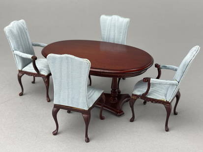 Oval Dining Table W/ Bespaq Upholstered Chairs: 4 dining chairs in Mahoghany finish with blue watersilk fabric. One chair has had an arm and leg repaired. Table may be Bespaq but no label. Table is 5 1/2 x 3 1/2 x 2 3/4" tall. Completely
