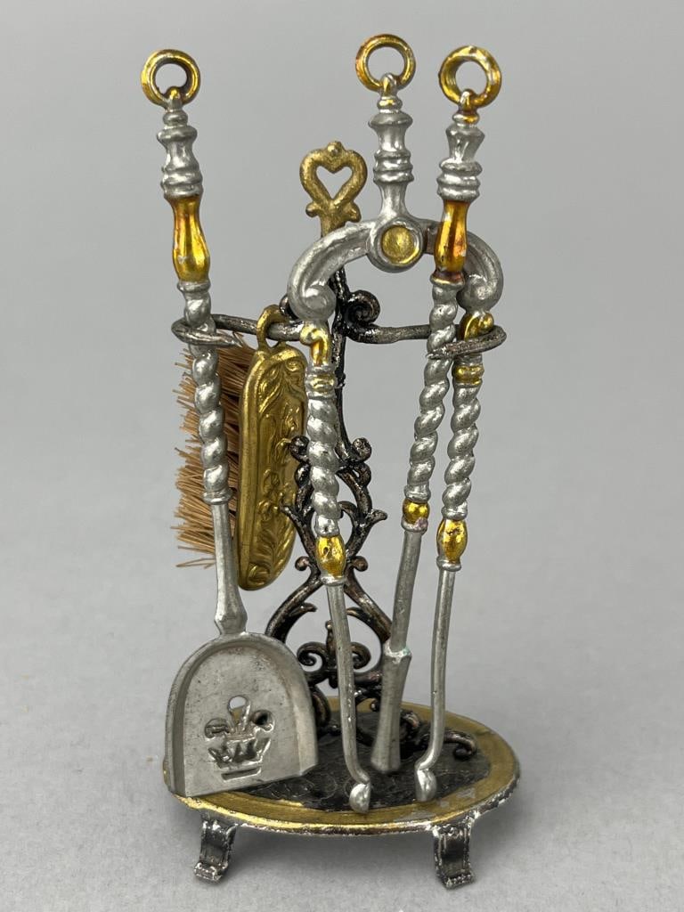 Metal German Andiron Set, Round Base: 1 3/4 x 1 x 3" tall. Poker, brush, shovel and tongs. Excellent. Could be Erhard & Sohne. Rare.