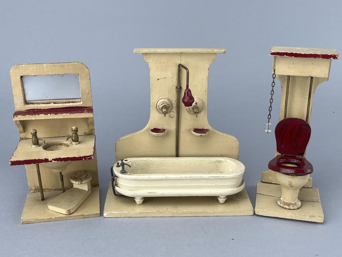 Gottschaulk German Bathroom. Wood: Painted wood, 1890-1920. Shower, sink, tub and pull chain toilet. Cream with red trim. Also scale. Tub missing one faucet. All have metal pipes. Shower and toilet are. 7" tall. Sink is 61/4" tall, mis