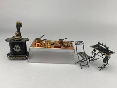 Copper Utensils, Sewing Machine, Stove, Chair: 13 copper utensils, Very early soft metal sewing machine. Cast iron parlor stove, modern. Folding metal chair, early piece. Plastic stand used in photos is not included.