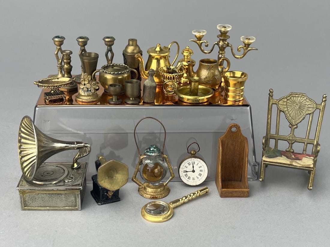 Brass Accessories: Large assortment of brass kitchenware, 2 phonographs, candlesticks, small chair, clock and more. Plastic stand used in photos not included.