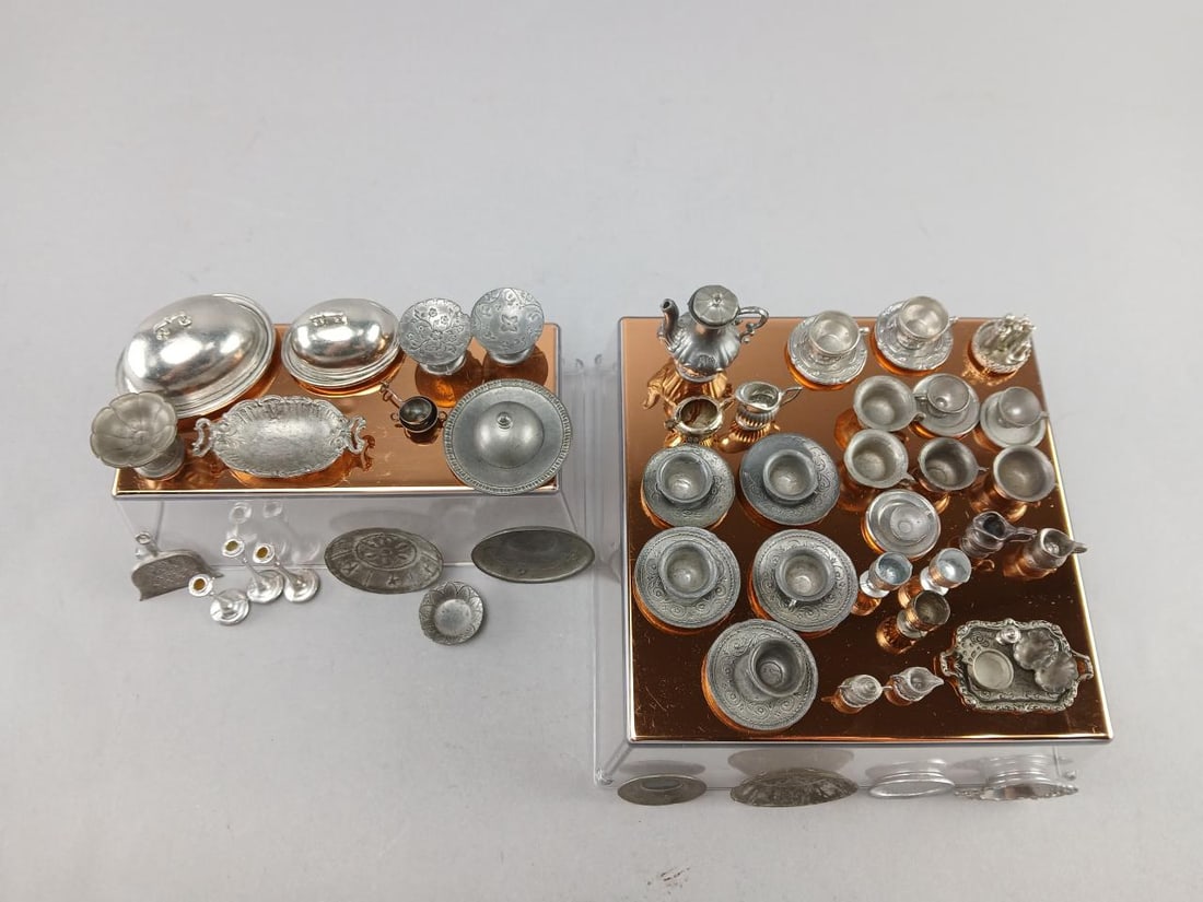 Large Assortment Of Kitchenware: Metal trays, pots and pans, dishes. Display stands not included.