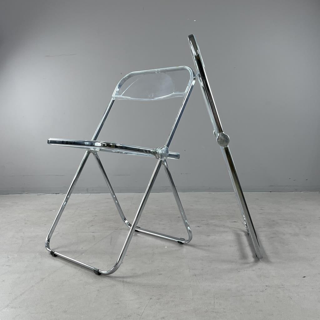 Pair of Giancarlo Piretti Plia Folding Chairs: Pair of Giancarlo Piretti (Italian, b. 1940) Plia folding chairs, introduced in 1967 at the Milan Furniture Fair, and produced by Anonima Castelli (Italy), chrome-plated steel and polycarbonate, late