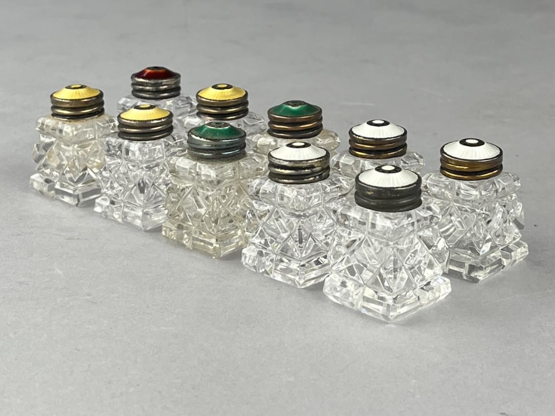 Hroar Prydz Crystal & 925 Salt & Pepper Shakers: Hroar Prydz (Norwegian, 1859-1937), pressed and cut glass salt and pepper shakers, with sterling silver tops with multicolored guilloche enamel, the rims stamped "Sterling (Prydz's crown mark) Norway,