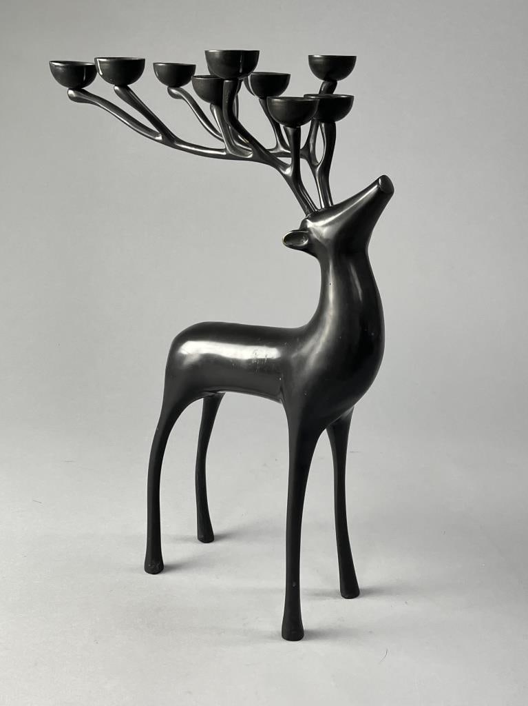 Pottery Barn Bronze 20" Reindeer Candle Holder: Pottery Barn bronze toned brass reindeer 10 votive candle holder or candelabra, approximately 20" in height, in original box. SHIPPING: In-Hou