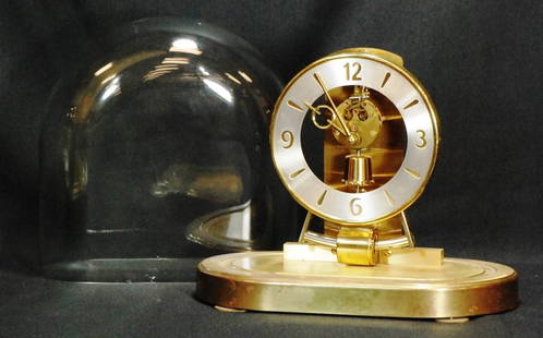 Kieninger & Obergfell Domed Mantle Clock: Made in Western Germany Six jewels unadjusted - Some flakes in the bottom of the glass dome 10" wide and 9" tall