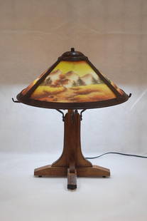 Reverse Painted Arts & Crafts Lamp: Shade depicts outdoor landscape. 20.5" H, 18" W.