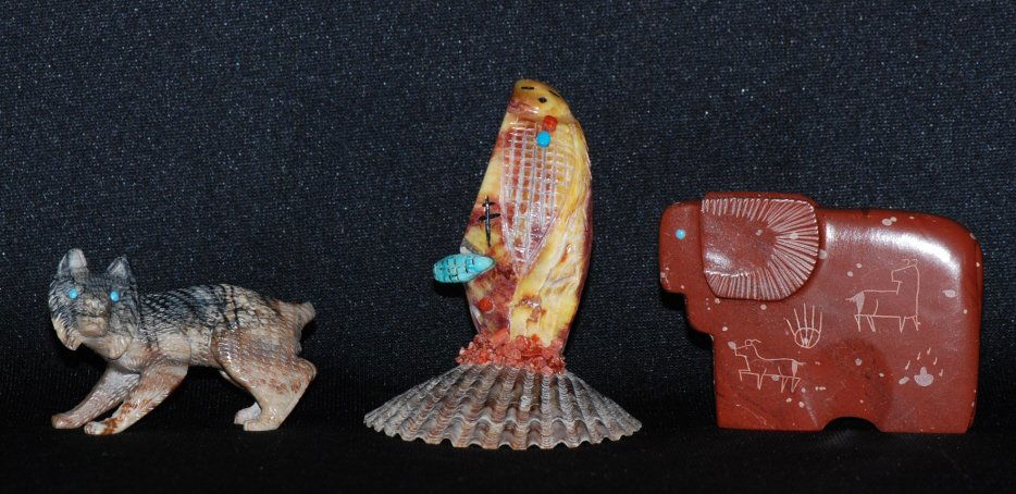 Three Hand Crafted Animal Sculptures: Spirit Of The Lioness Native American Arts Picasso Marble Bobcat By Lance Cheama Zuni Pipestone ram by Ulysses Mahkee Zuni Spiny oyster shell maiden by Donavon Chattin Zuni All have C.O.A.