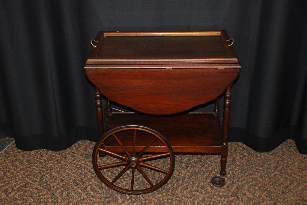 Vintage Walnut Tea Cart with Tray: Circa 1940 18" x 27" x 29" Rubber missing from one small Wheel - varnish on top is crazed and darkened