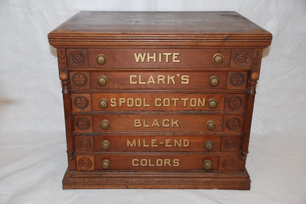 Antique 6 Drawer Clark's Spool Cabinet: 25.5"W, 22"H, 19.25" Deep Missing Medallions Some damage on back panel.