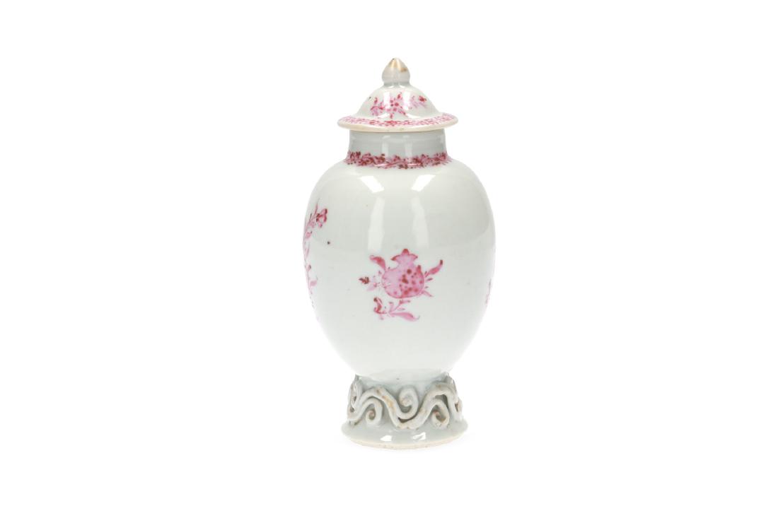 A pink and white porcelain export set with a tea caddy: A pink and white porcelain export set with a tea caddy and milk jug with cover, with floral decor in European style. Unmarked. China, Qianlong. H. ca. 14 cm.