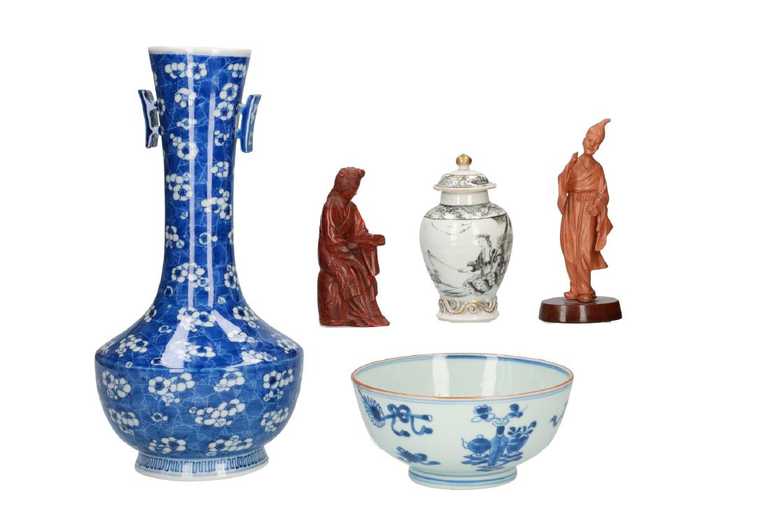 A diverse lot including; 1) a blue and white porcelain (1 of 1)