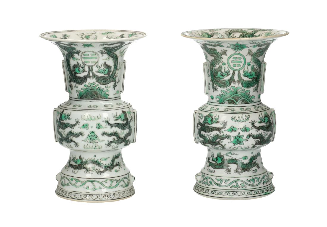 A lot of two polychrome porcelain vases, decorated with (1 of 12)