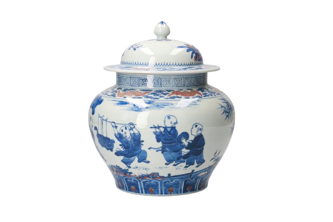 A lot of two polychrome porcelain lidded jars, (1 of 13)