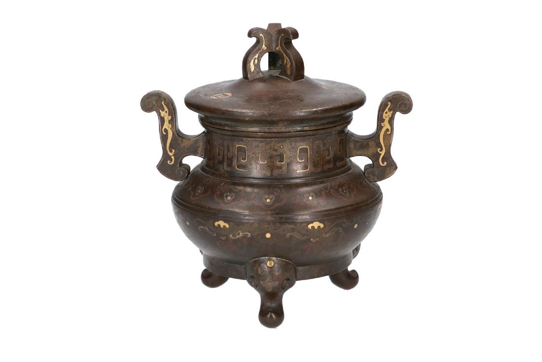 A bronze tripod koro, inlaid with gold decor including (1 of 6)