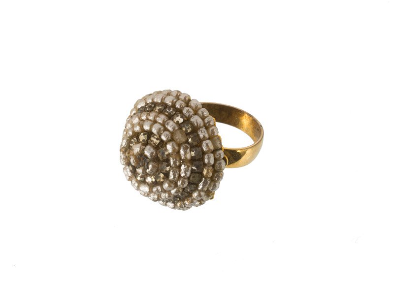 An Anonymous goldtone ring, set with faux pearls. (1 of 1)