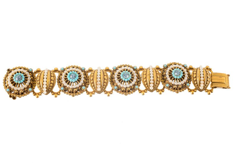 A Coro (attributed to) goldtone link bracelet, set with: A Coro (attributed to) goldtone link bracelet, set with rhinestones, faux pearls and faux turquoise. Unsigned. L. 18 cm.