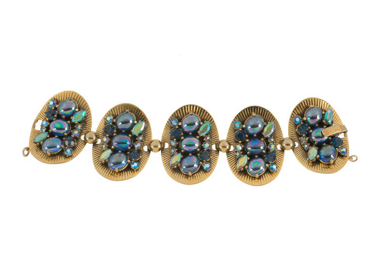An Elsa Schiaparelli goldtone link bracelet, set with (1 of 2)