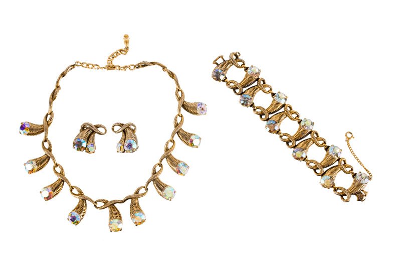 An Elsa Schiaparelli goldtone demi-parure, bracelet, (1 of 1)