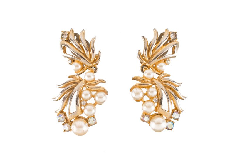 An Elsa Schiaparelli pair of goldtone earclips, set (1 of 3)