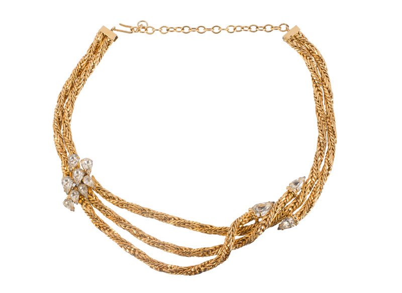 A Hattie Carnegie goldtone necklace set with: A Hattie Carnegie goldtone necklace set with rhinestones. Signed Hattie Carnegie. L. 41 cm.