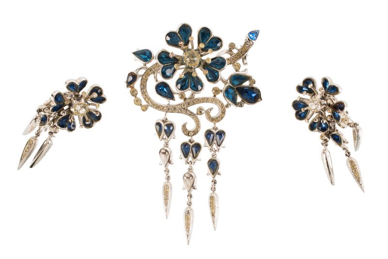 A Trifari silvertone brooch and pair of earclips, set (1 of 1)