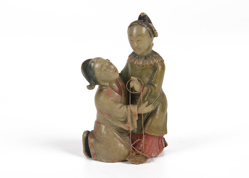A soapstone sculpture of two court ladies. China, ca.: A soapstone sculpture of two court ladies. China, ca. 1900. H. 13 cm.