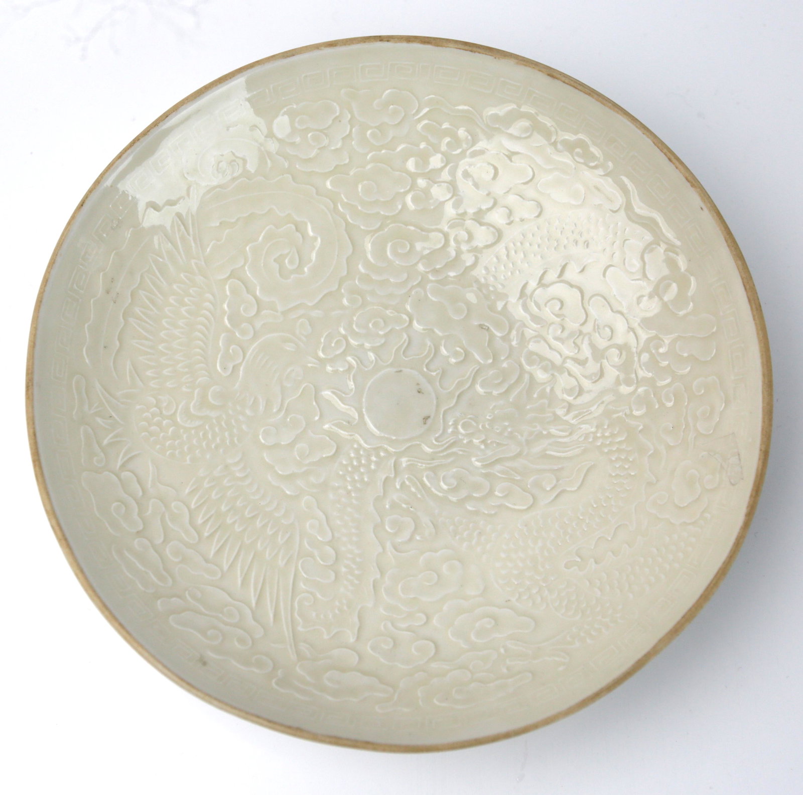 A Chinese Ding Kilm Molded Bowl, (1 of 4)