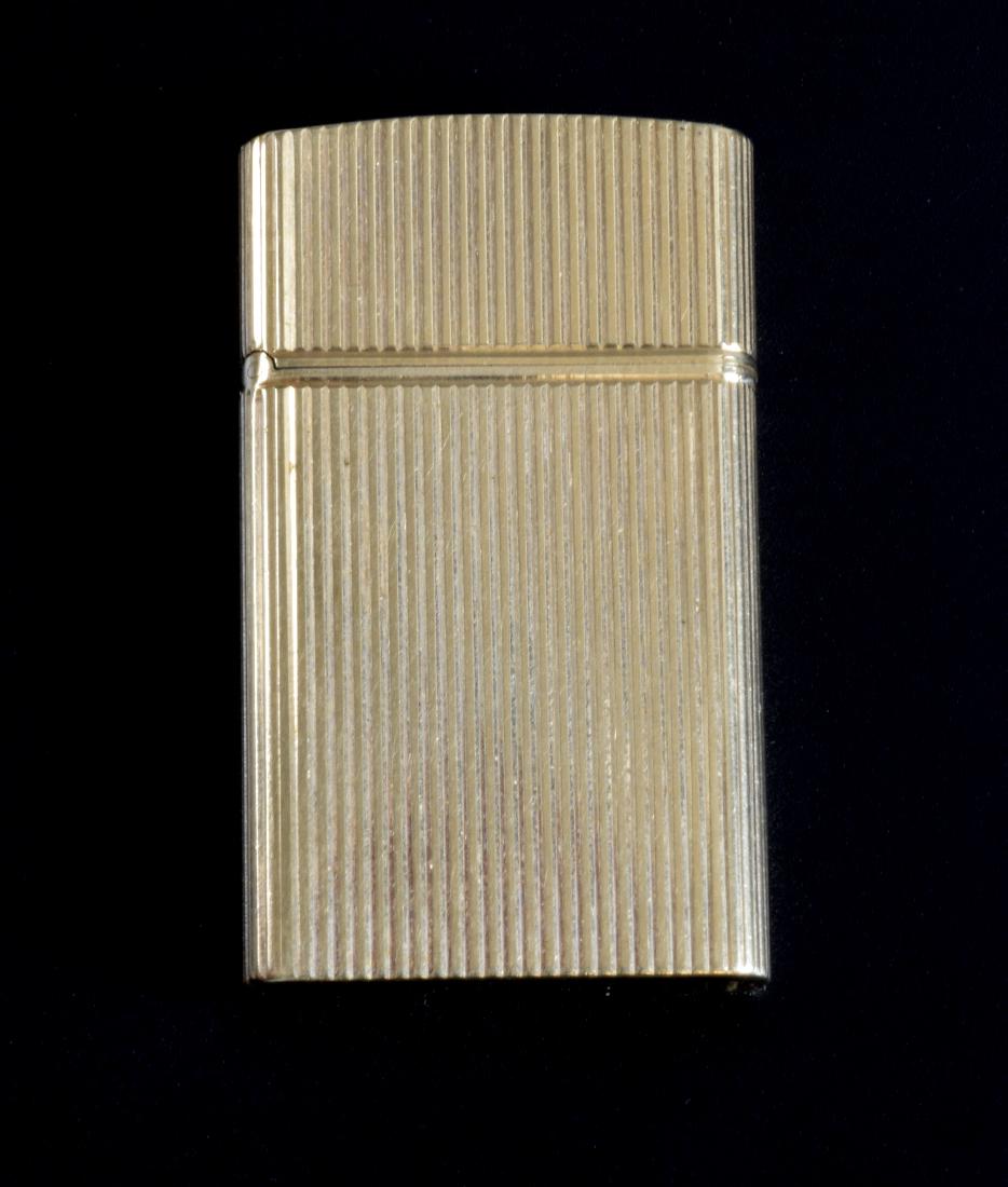 Tiffany & Co 14ct gold cigarette lighter. 5 cms x (1 of 3)