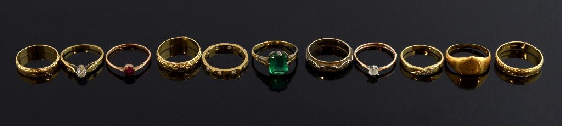 Eleven rings, one set with diamond and diamond sho (1 of 1)