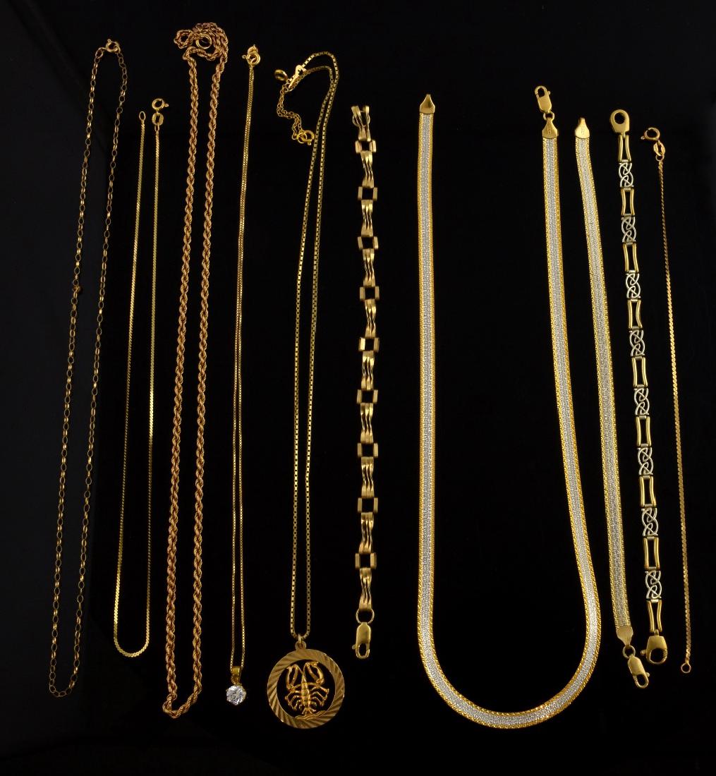A group of gold jewellery, two colour gold  flat w (1 of 1)