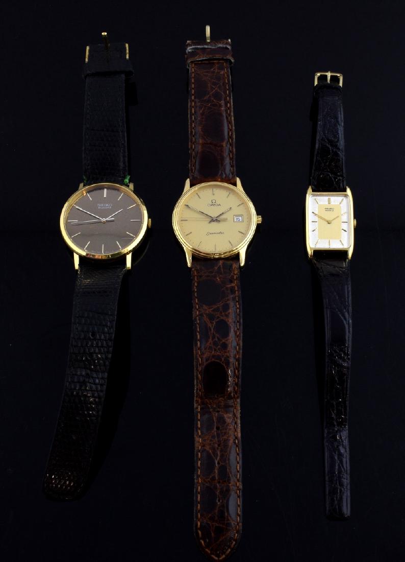 Three watches including a Omega Seamaster 9ct gold (1 of 2)