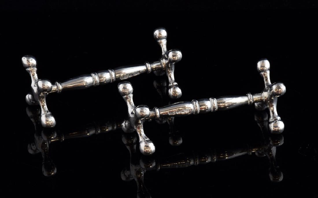 Pair of George V silver knife rests with X-shaped (1 of 1)