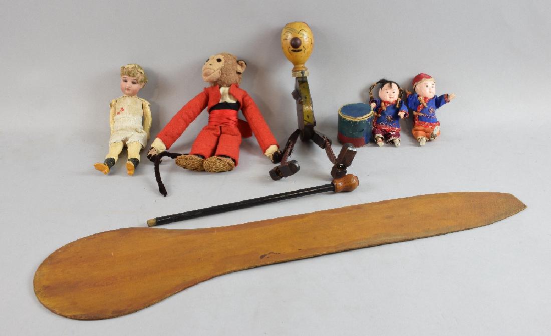 Early 20th Jolly Boy with spring board, bisque hea: Early 20th Jolly Boy with spring board, bisque headed doll, monkey soft toy and two Chinese dolls.