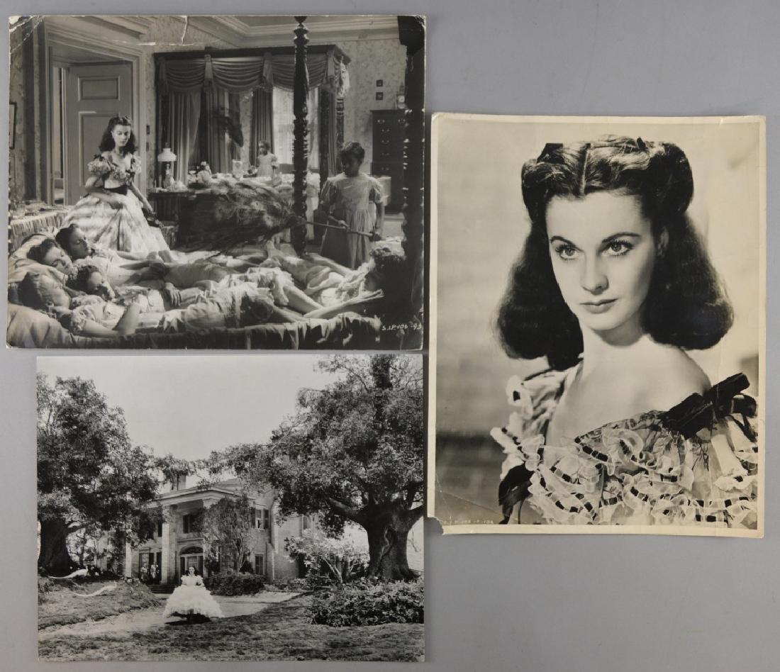 Gone With The Wind - Three original black & white: Gone With The Wind - Three original black & white photographs, two showing scenes from the film & the other a portrait of Vivien Leigh, 12 x 15 inches approx (3)