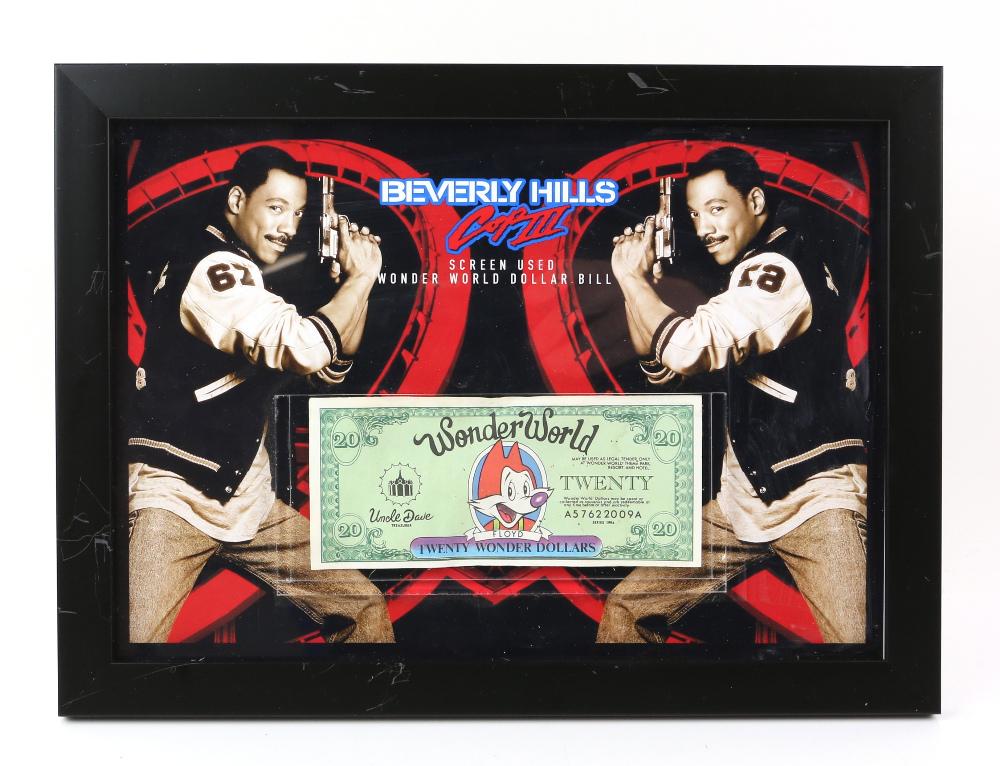 Beverly Hills Cop III (1994) screen used: Beverly Hills Cop III (1994) screen used Wonder World dollar bill, in framed display, 13 x 9 1/2 inches overall.