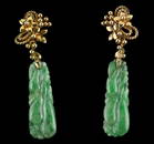 A pair of jadeite jade earrings, carved plum Jade