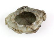 A jade brush-washer of mottled hue, with varying g