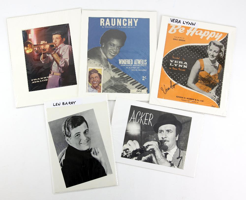 Music Autographs - Acker Bilk, Vera Lynn, Len Barr: Music Autographs - Acker Bilk, Vera Lynn, Len Barry, Winifred Atwell and Frankie Avalon, most 10 x 8 inches and a Bryan Ferry signed book (6). Bryan Ferry may be a printed signature.