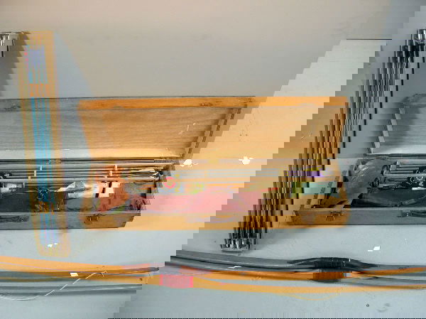 Various archery equipment including two bows and a: Various archery equipment including two bows and a box and contents arrows etc