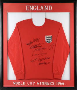 England - Signed 1966 World Cup Winners Shirt, Nin: England - Signed 1966 World Cup Winners Shirt, Nine signatures from Bobby Charlton, Geoff Hurst, Martin Peters, George Cohen, Alan Ball, Nobby Stiles, Ray Wilson, Gordon Banks and Geoff Hunt, framed a