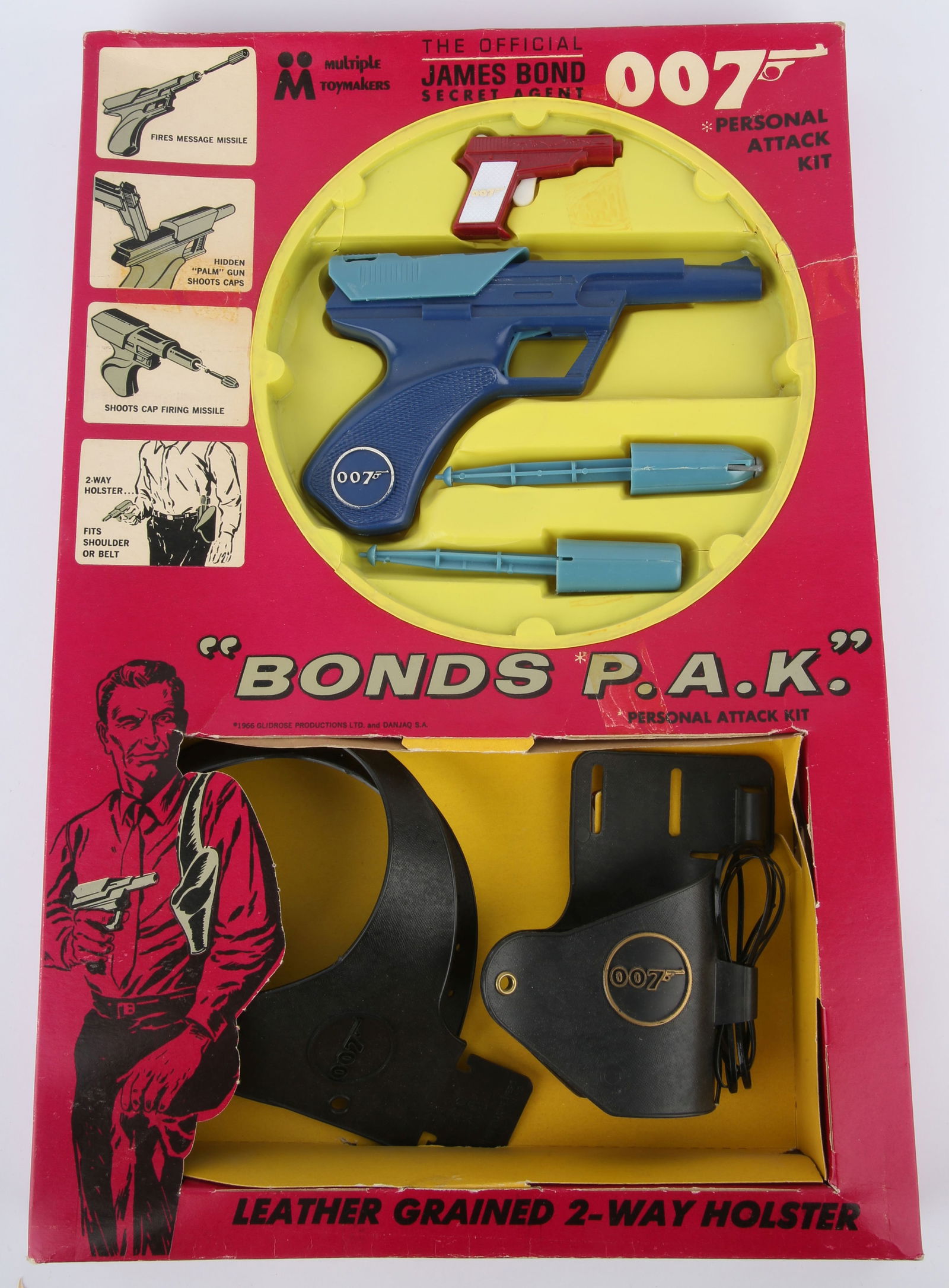 James Bond 007. Multiple Toymakers Bond's P.A.K. (: James Bond 007. Multiple Toymakers Bond's P.A.K. (Personal Attack Kit), 1966. Includes dart gun pistol with two darts, small palm gun and holster, with Instructions, boxed.