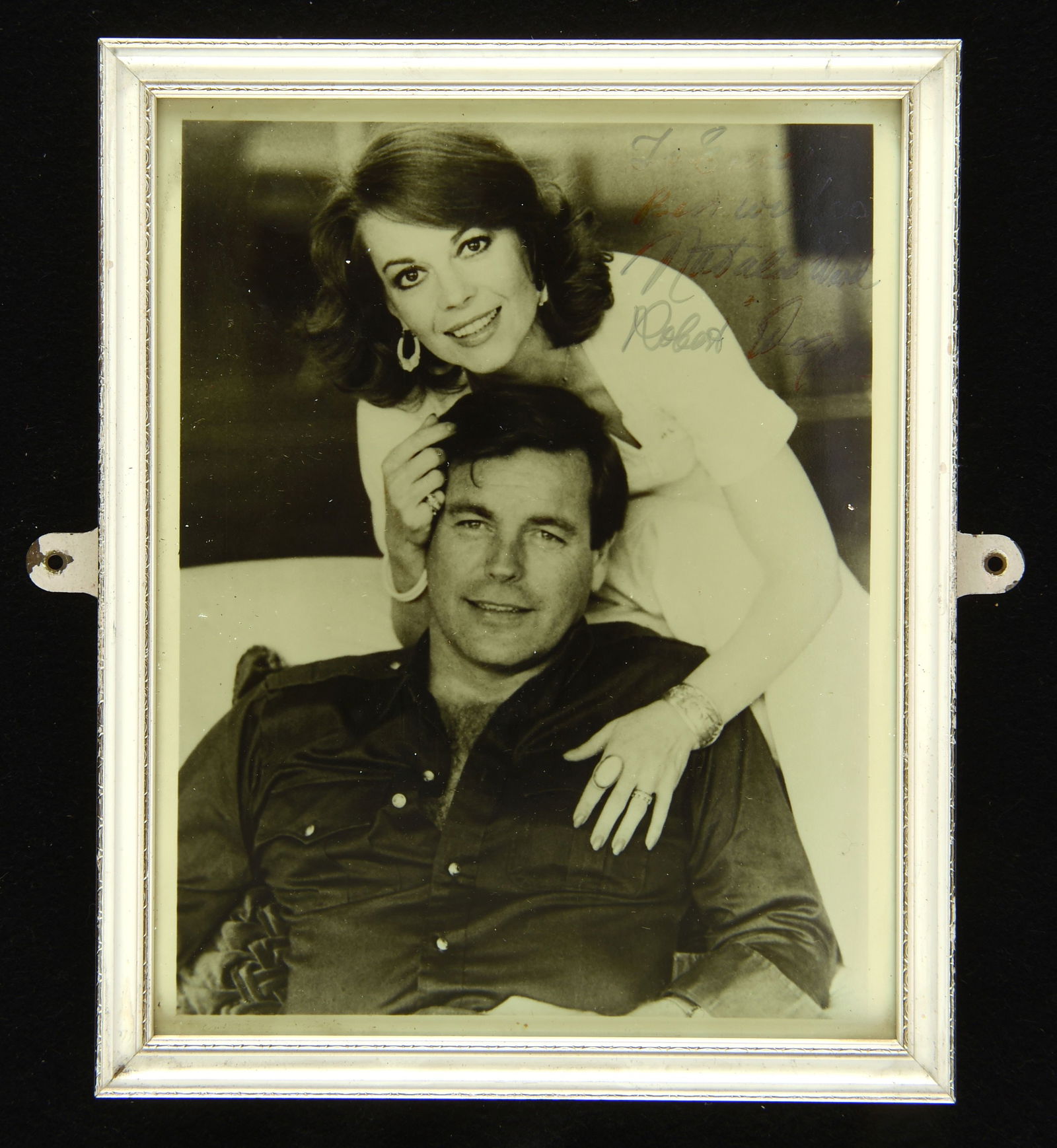 Robert Wagner (1930-) and Natalie Wood (1938-1981): Robert Wagner (1930-) and Natalie Wood (1938-1981) Framed Autographed photograph – black and white photograph, dedicated to Eric and individually signed by the married acting couple, framed and