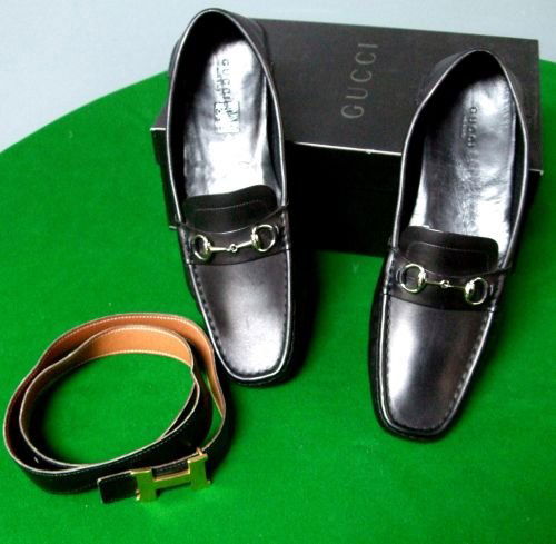 Pair of Gucci black leather loafers and a black leather: Pair of Gucci black leather loafers and a black leather Hermes belt with H clasp