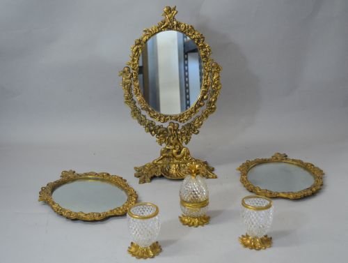 Set of three brass framed dressing table mirrors and a : Set of three brass framed dressing table mirrors and a set of three cut glass and gilt vanity containers