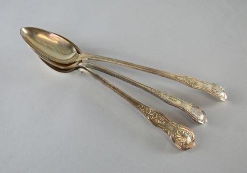 Three silver plated Kings pattern serving spoons,