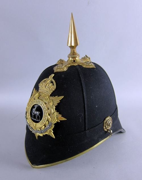 Edwardian Home Service Pattern blue cloth Officers: Edwardian Home Service Pattern blue cloth Officers Helmet, marked for the Royal Warwickshire Regiment, by F. W. Flight, Military Outfitters, 90 High St. Winchester, with chin strap and a set of spurs,