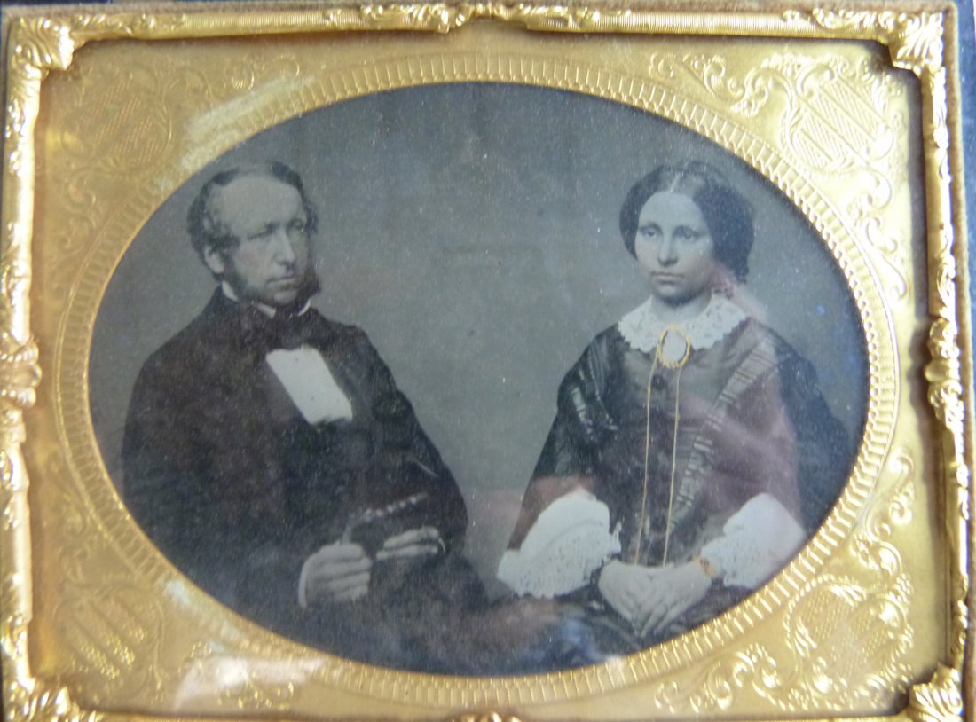 19th century Victorian Ambrotype photograph in gilt: 19th century Victorian Ambrotype photograph in gilt metal frame in moulded vulcanite folding case 6 x 5in. (15 x 13cm)